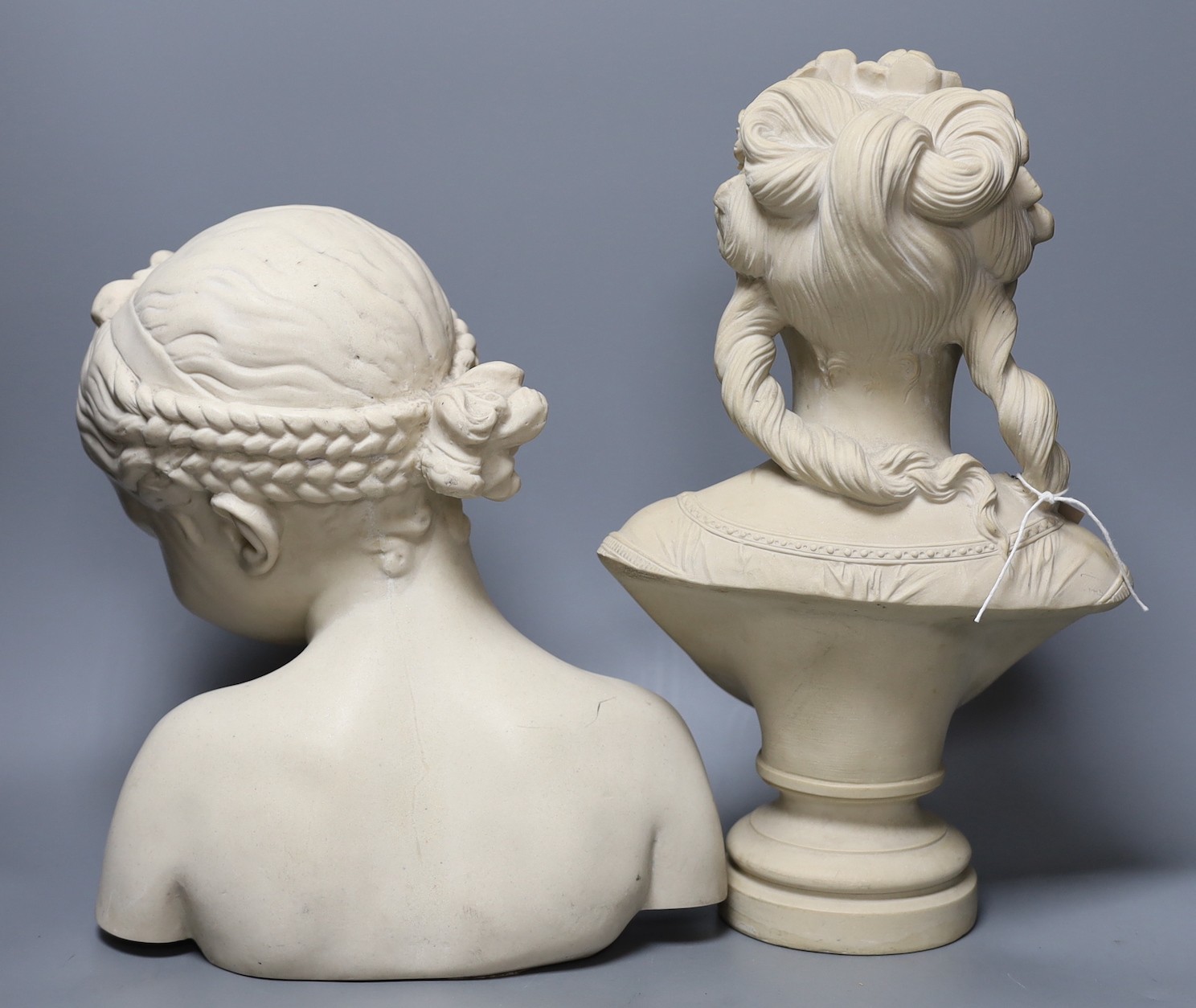 Two period-style resin marble female busts, tallest 39 cms high